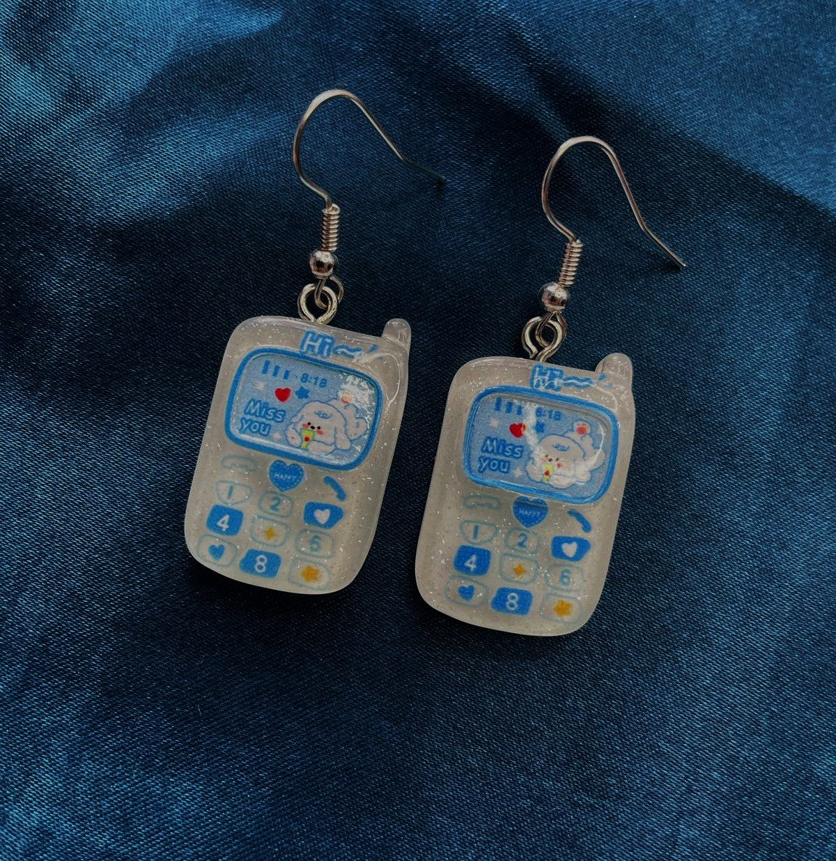 Aretes Teléfono