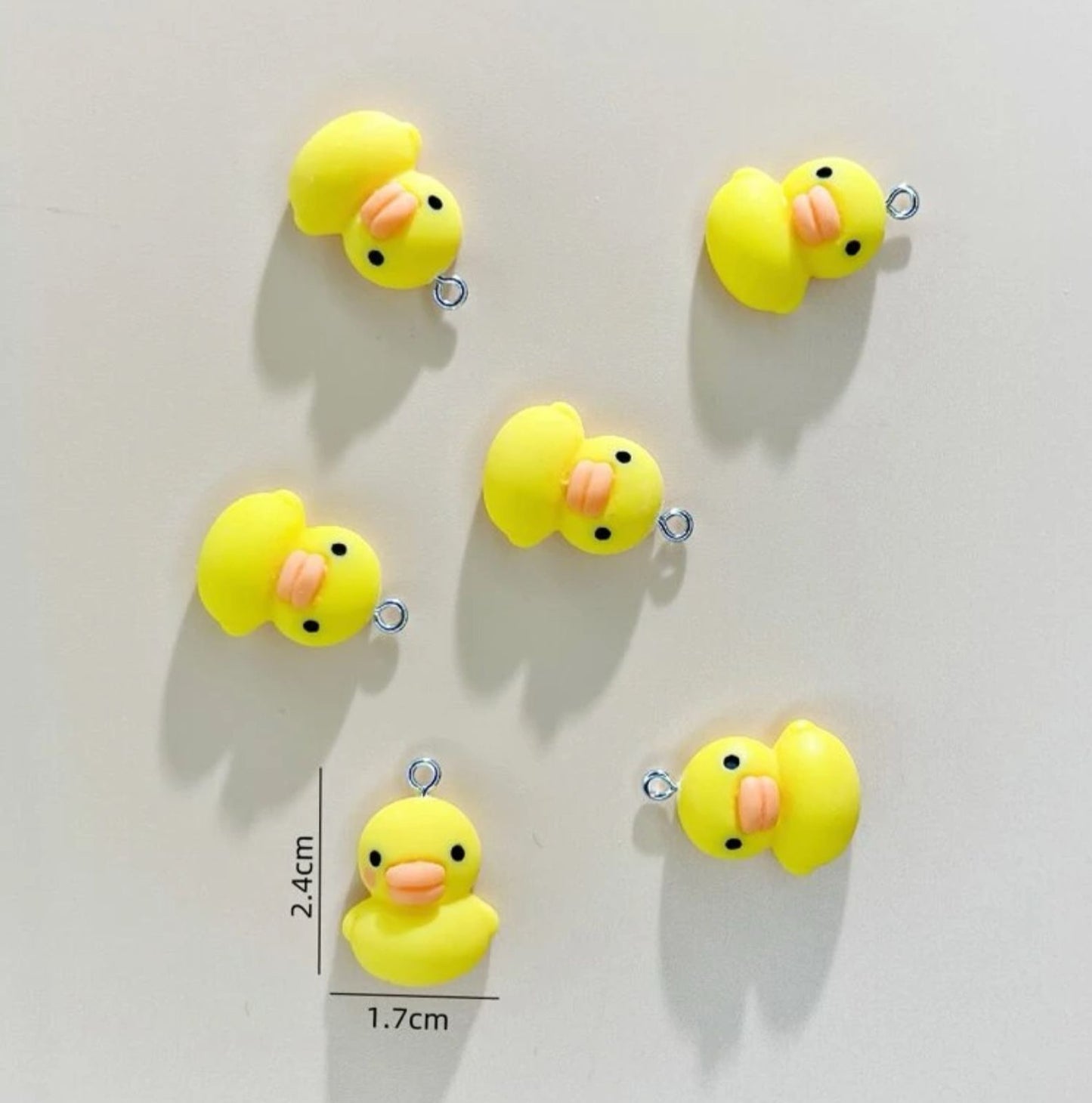 Dije de Patitos Planos