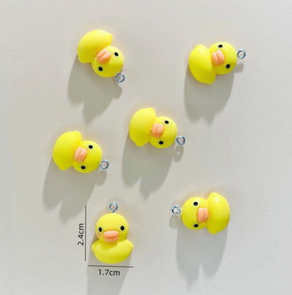 Dije de Patitos Planos